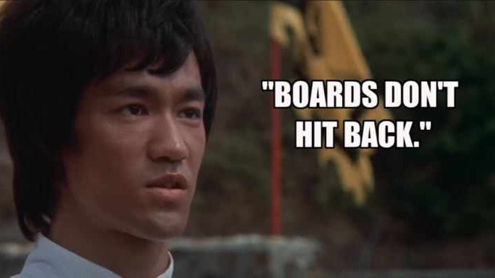Bruce Lee in Enter The Dragon - Boards Don't Hit Back