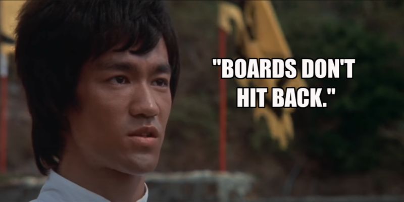 Bruce Lee in Enter The Dragon - Boards Don't Hit Back
